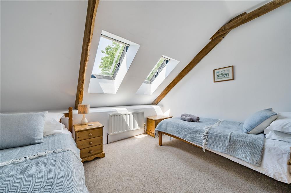Bedroom three, with twin 3’ single beds at Hayloft Cottage, Totnes