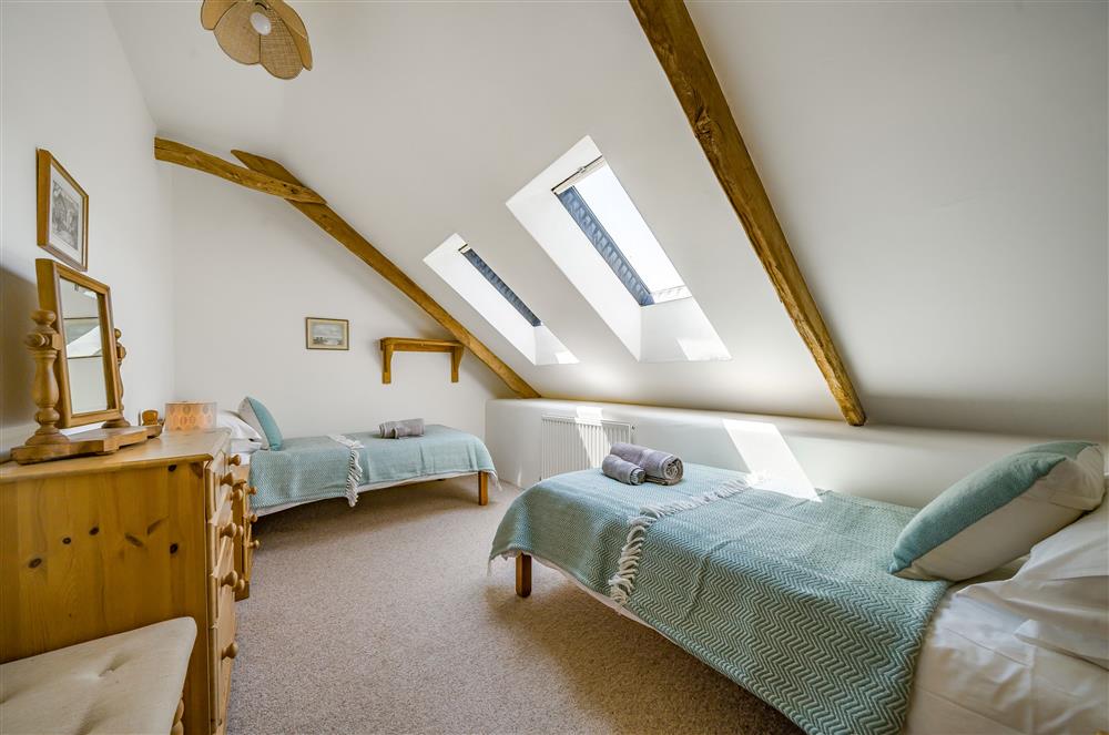 Bedroom two, with twin 3’ single beds. at Hayloft Cottage, Totnes