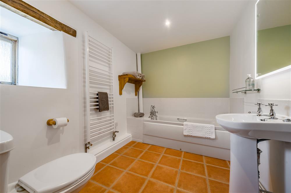 The ground floor bathroom which sits next door to a separate shower room at Hayloft Cottage, Totnes