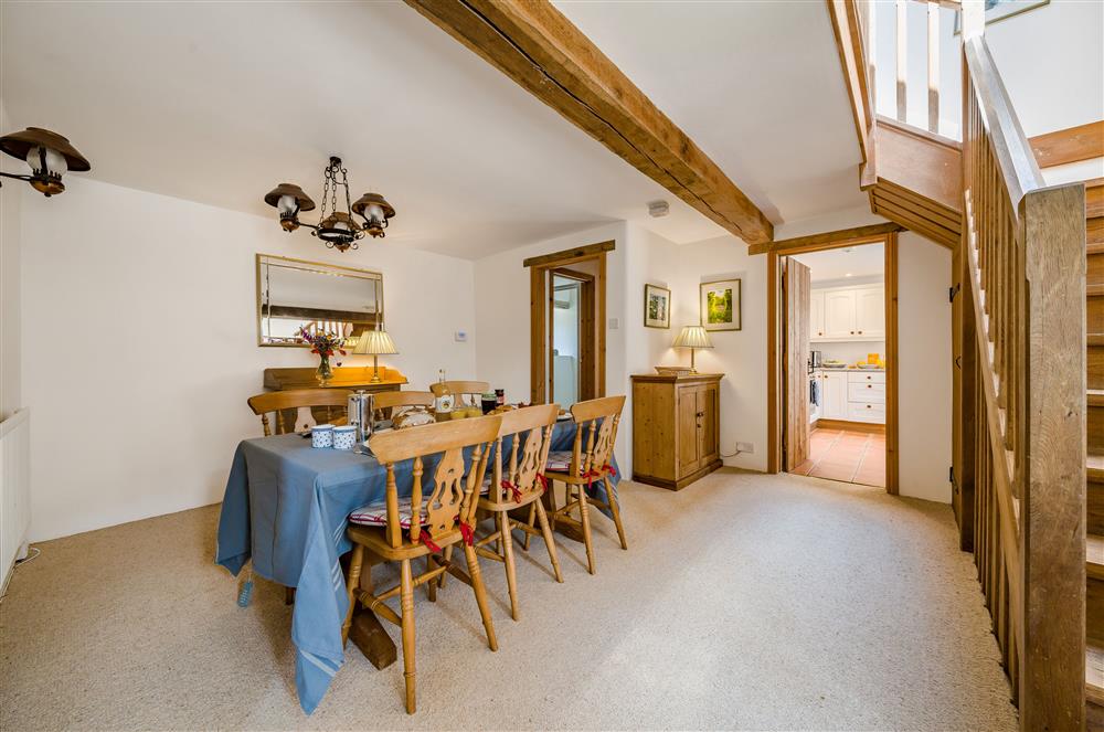 The ground floor dining room leading through to the kitchen at Hayloft Cottage, Totnes