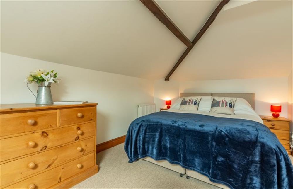 First floor: Bedroom one at Hayloft Cottage, Wells-next-the-Sea
