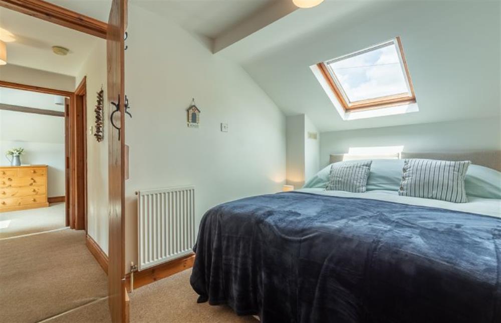 First floor: Bedroom two at Hayloft Cottage, Wells-next-the-Sea