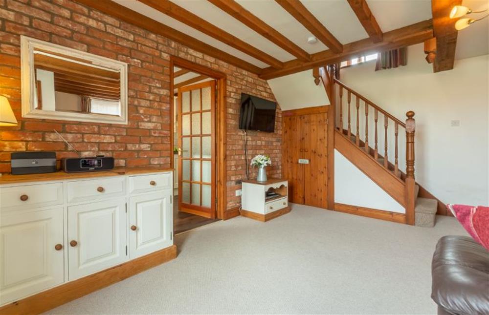 Ground floor: Sitting room at Hayloft Cottage, Wells-next-the-Sea