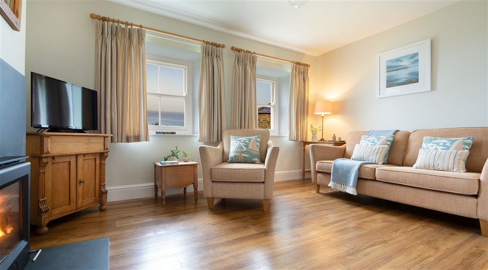 The sitting room, with sea views, (photo 2) at Hayloft in Truro, Cornwall
