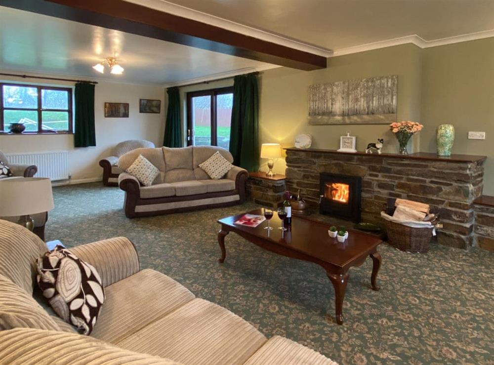 Spacious living room with additional seating area at Hayscastle Farmhouse, 