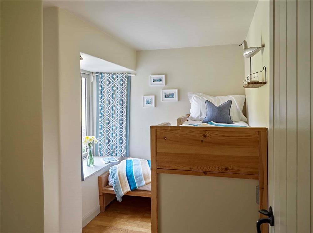 Bedroom three, with compact twin with L-shaped cabin beds, suitable for under 12’s at Haytor Cottage, Dartmouth