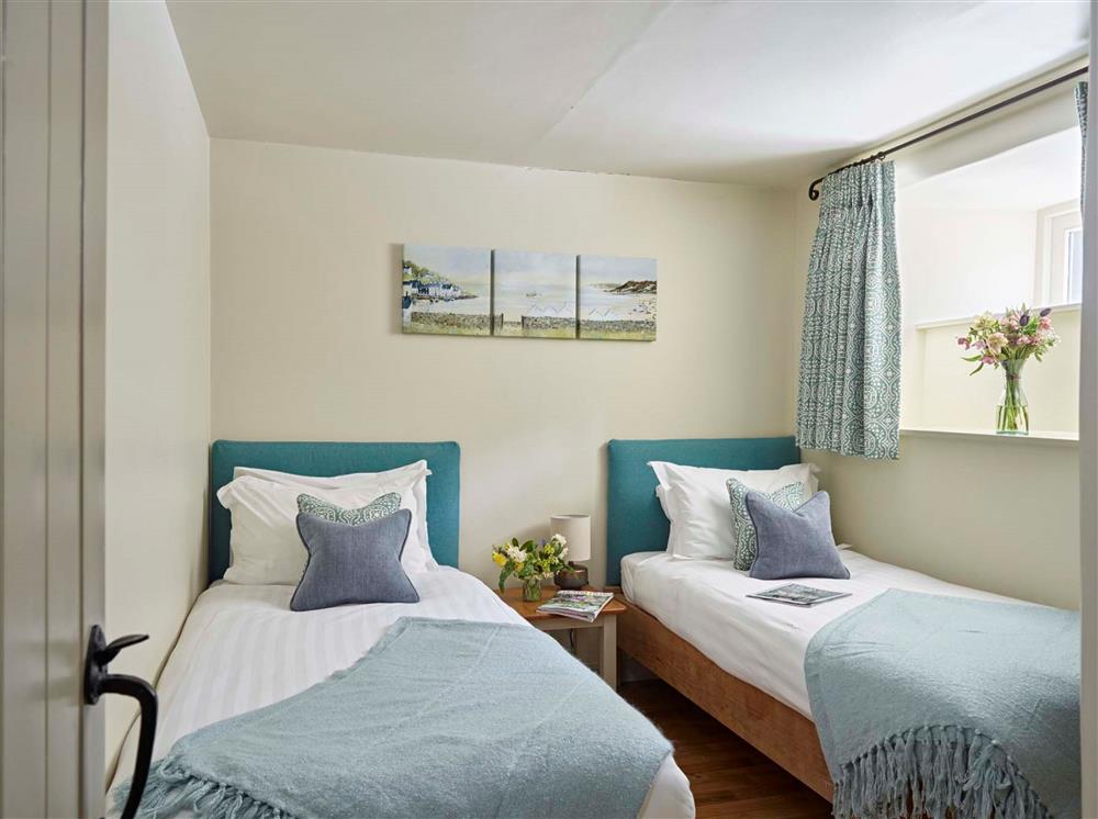 Bedroom two, with 3’ twin beds at Haytor Cottage, Dartmouth