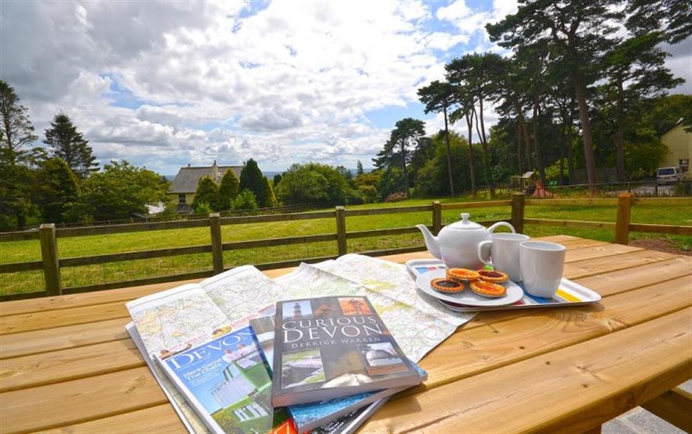 Plan the day whilst enjoying the garden. at Haytor View in Haytor
