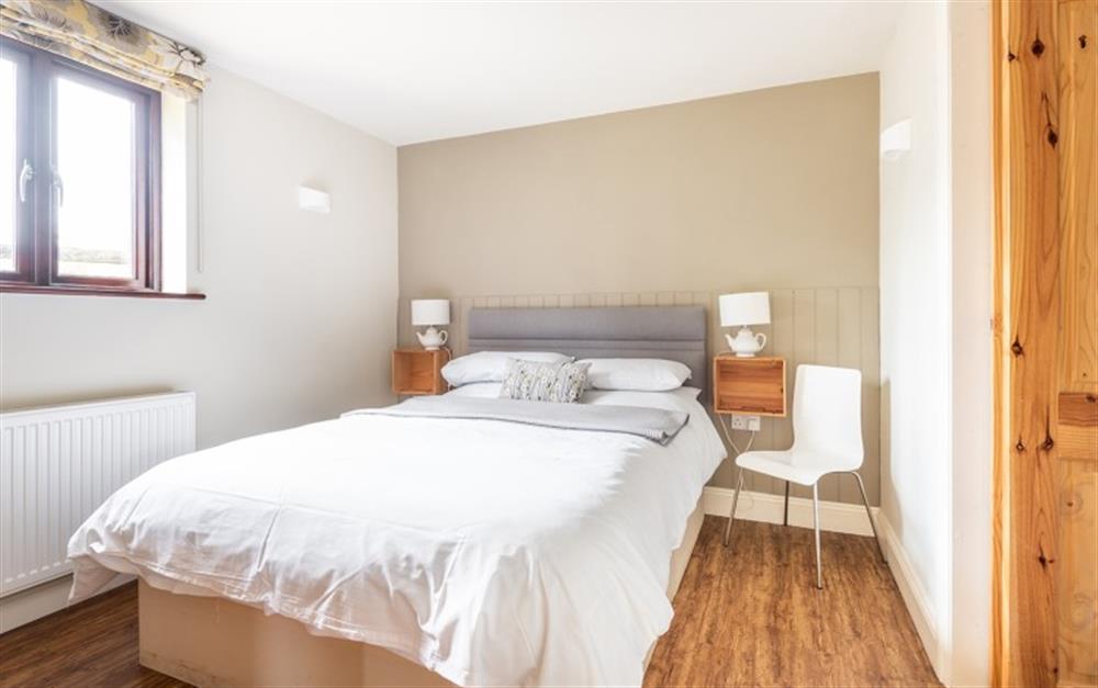 The cosy ground floor bedroom with en suite shower  at Haytor View in Haytor