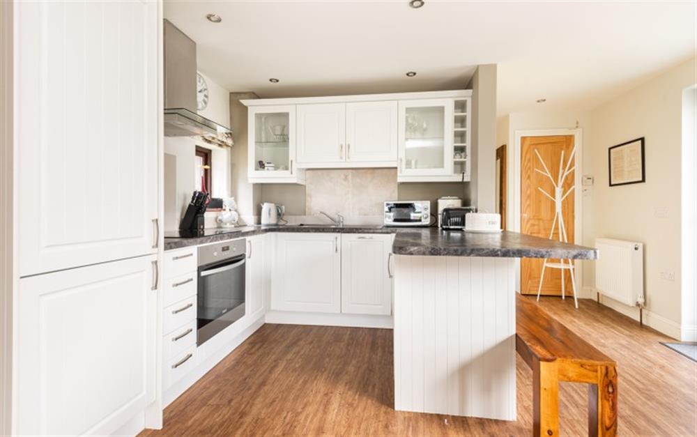 The modern kitchen is wonderful to cook in for family or friends. at Haytor View in Haytor