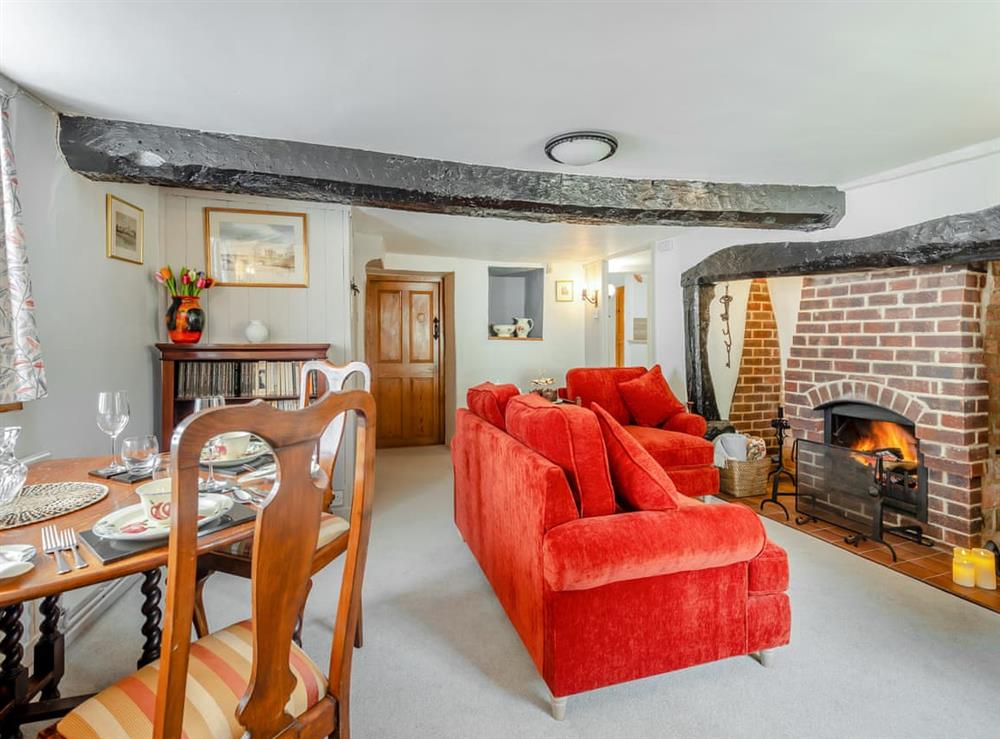 Living room/dining room at Hazel Cottage in Briantspuddle, near Wareham, Dorset