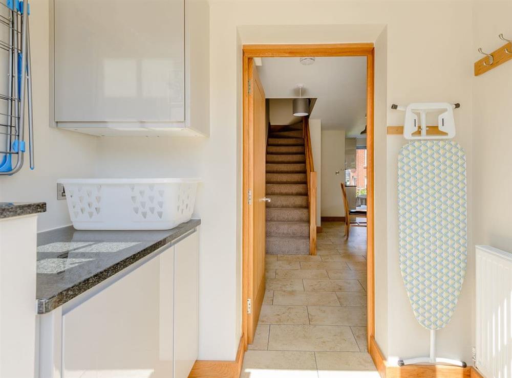 Useful utility room at Buttercup Cottage, 