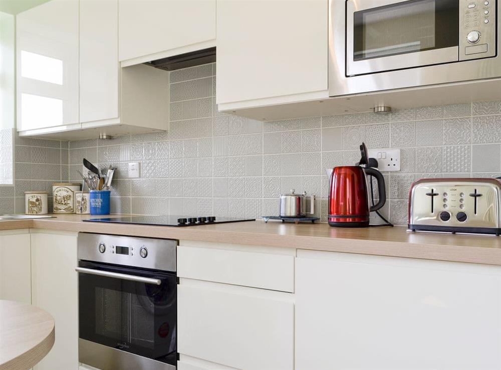 Well-equipped fitted kitchen at Hazeldene in Murton, near Swansea, Glamorgan, West Glamorgan