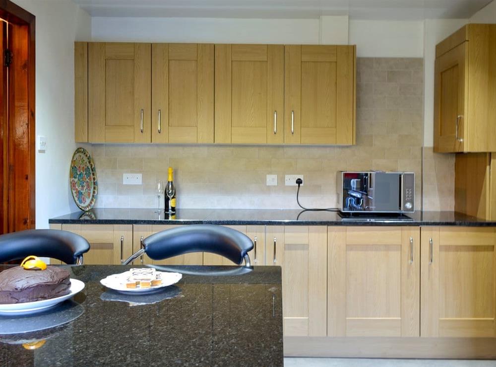 Kitchen with brakfast bar (photo 2) at Hazelmere in Rattray, near Blairgowrie, Perthshire