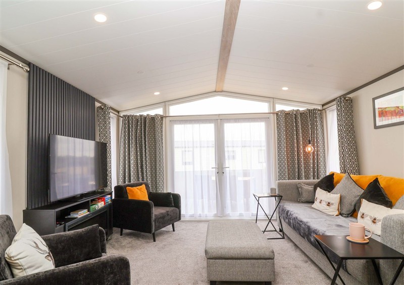 Enjoy the living room at Hazelnut Lodge, Chipping Norton