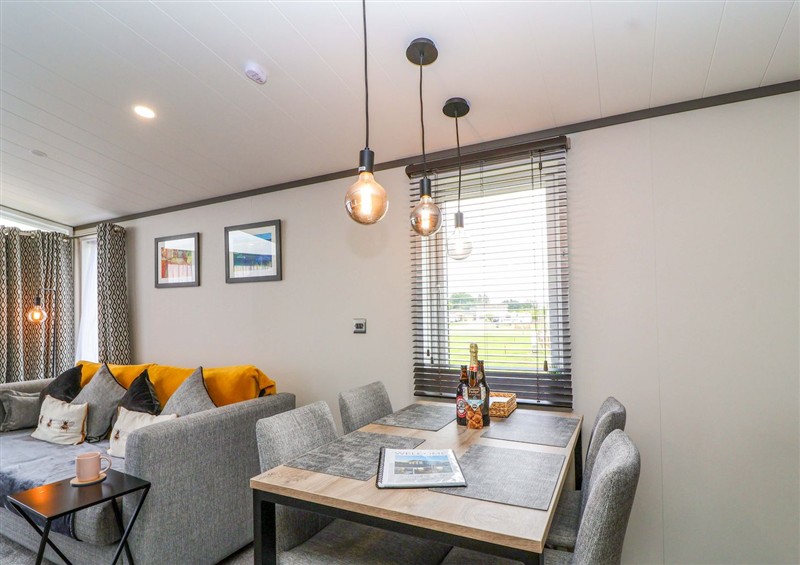 Relax in the living area (photo 2) at Hazelnut Lodge, Chipping Norton