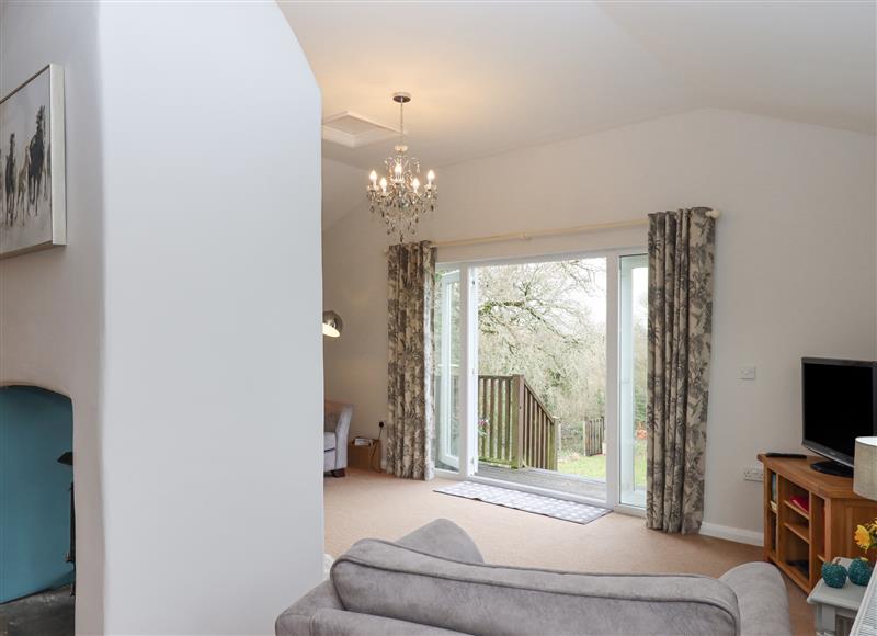 Relax in the living area at Hazelnut Lodge, Yeoford near Crediton