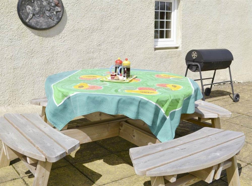 Outdoor furniture and BBQ on patio at Hazels Cottage in Tangy, near Campbeltown, Argyll and Bute, Scotland