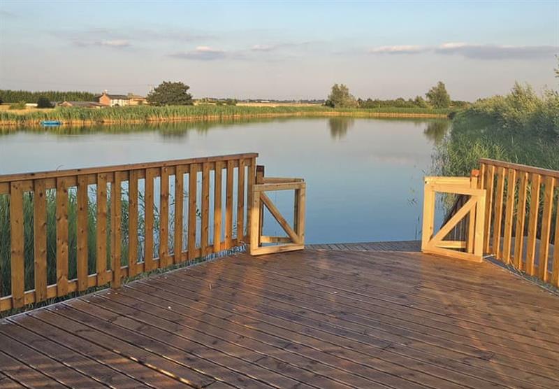 Lake View with decking at Head Fen Country Retreat in Ely, Cambridge