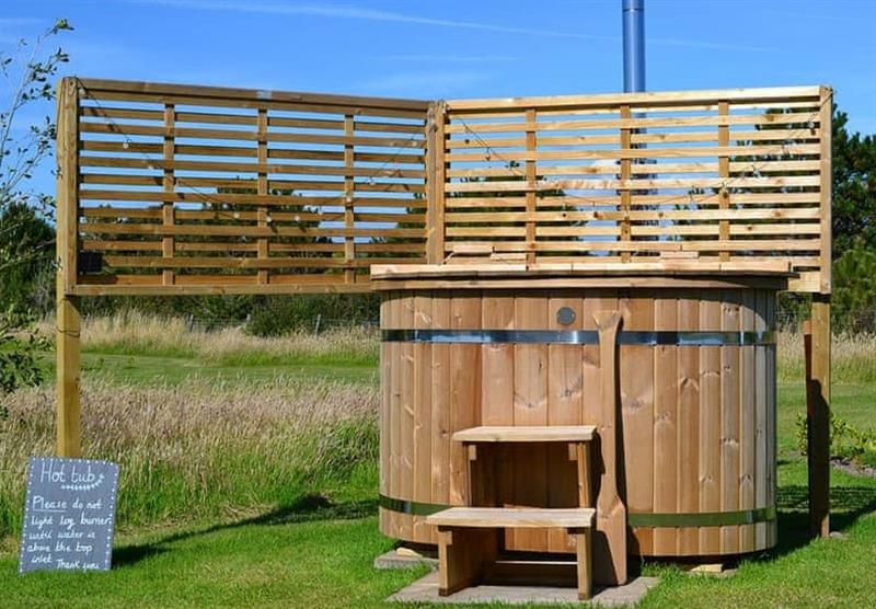 Wood fired hot tub in Hazel at Headland Escape in Lydstep, Pembrokeshire