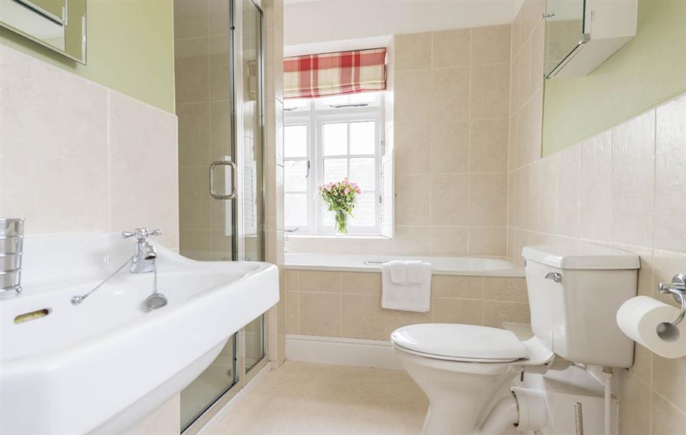 Family bathroom with bath and shower cubicle at Hearn Lodge, Bishops Lydeard