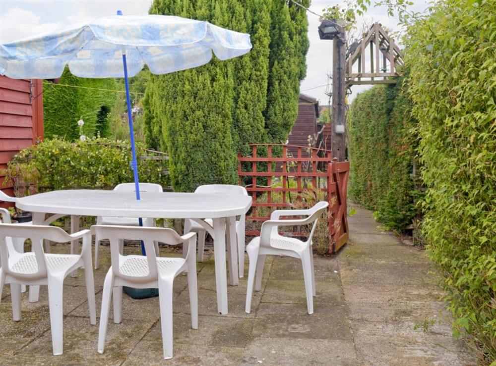 Additional outdoor furniture on patio area of rear garden at Heath View Cottage in Westleton, Suffolk