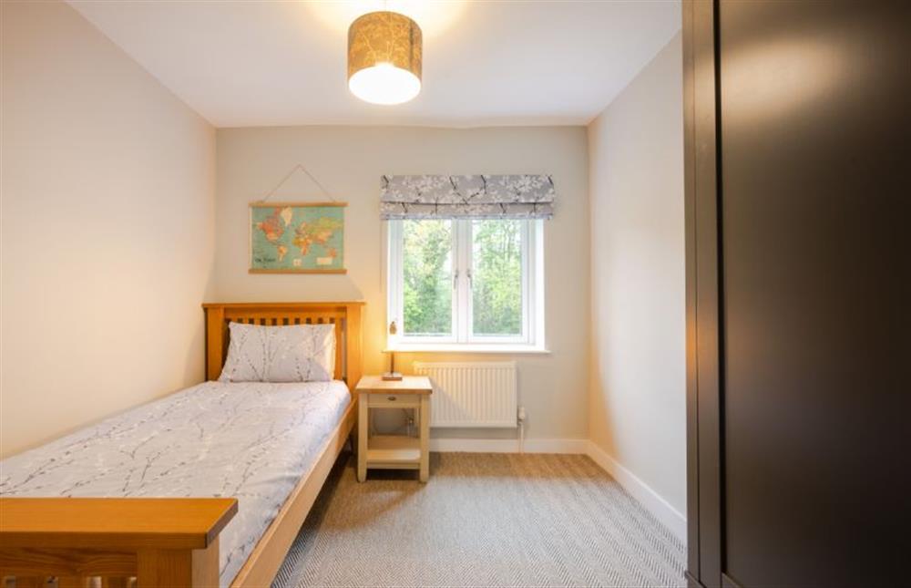 First floor: Bedroom four with a 3ft single bed at Heathcot, High Kelling near Holt
