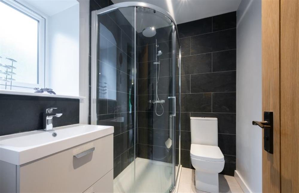 Ground floor: En-suite shower room with a walk-in shower, wash basin and WC at Heathcot, High Kelling near Holt