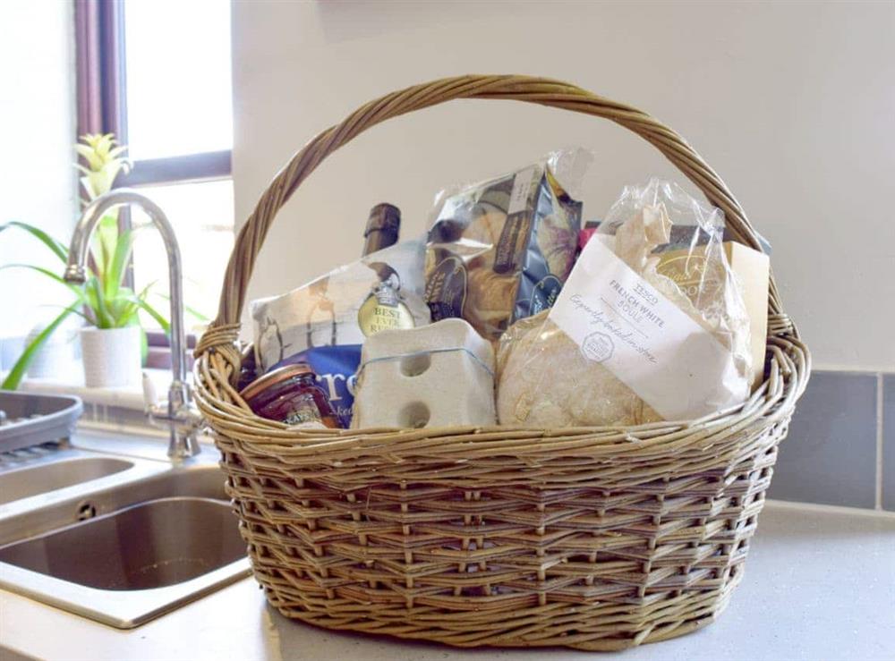 Tempting welcome pack for guests at Heathcote Cottage in Hickling, near Wroxham, Norfolk