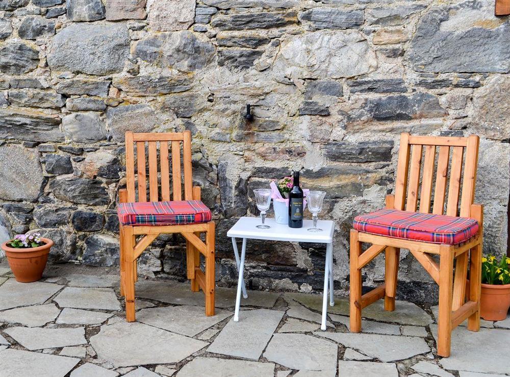Sitting-out area and garden furniture at Heather Barn in Balnain, near Inverness, Highlands, Inverness-Shire