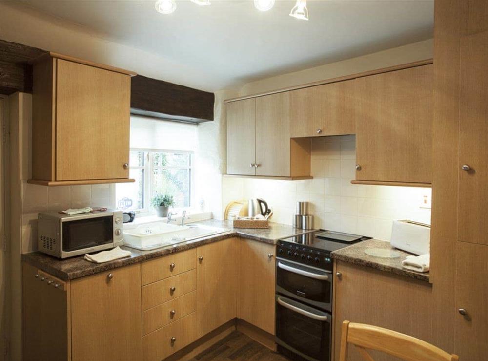 Spacious kitchen with dining area at Heather Cottage in Hutton-le-Hole, near Kirkbymoorside, North Yorkshire