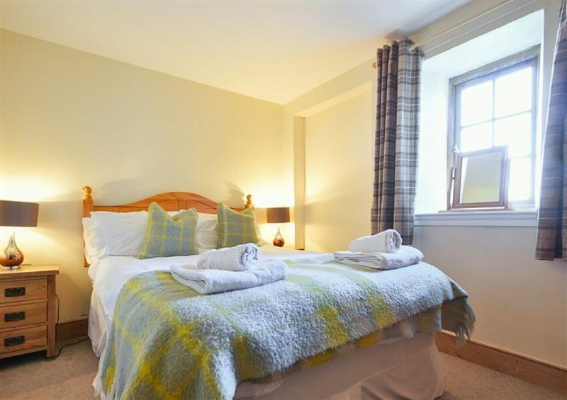 A bedroom in Heather Cottages - Grey Seal at Heather Cottages - Grey Seal, Bamburgh
