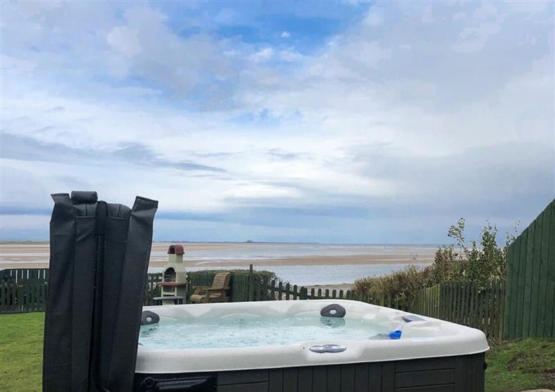 Enjoy the hot tub at Heather Cottages - Grey Seal, Bamburgh