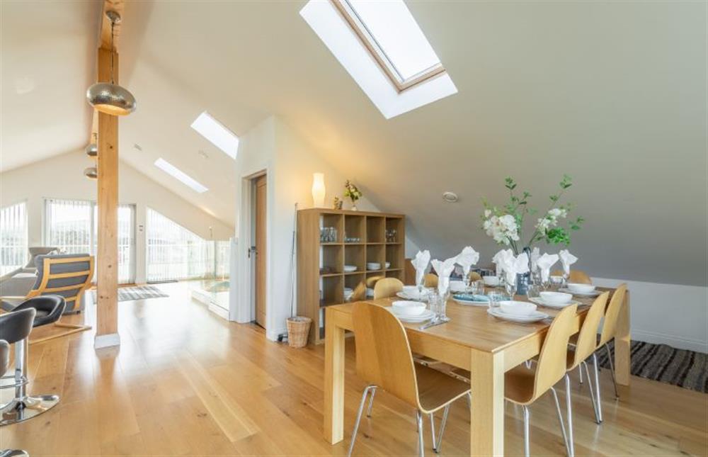Open plan living area with dining table and seating for nine (photo 4) at Heatherbank, St Agnes