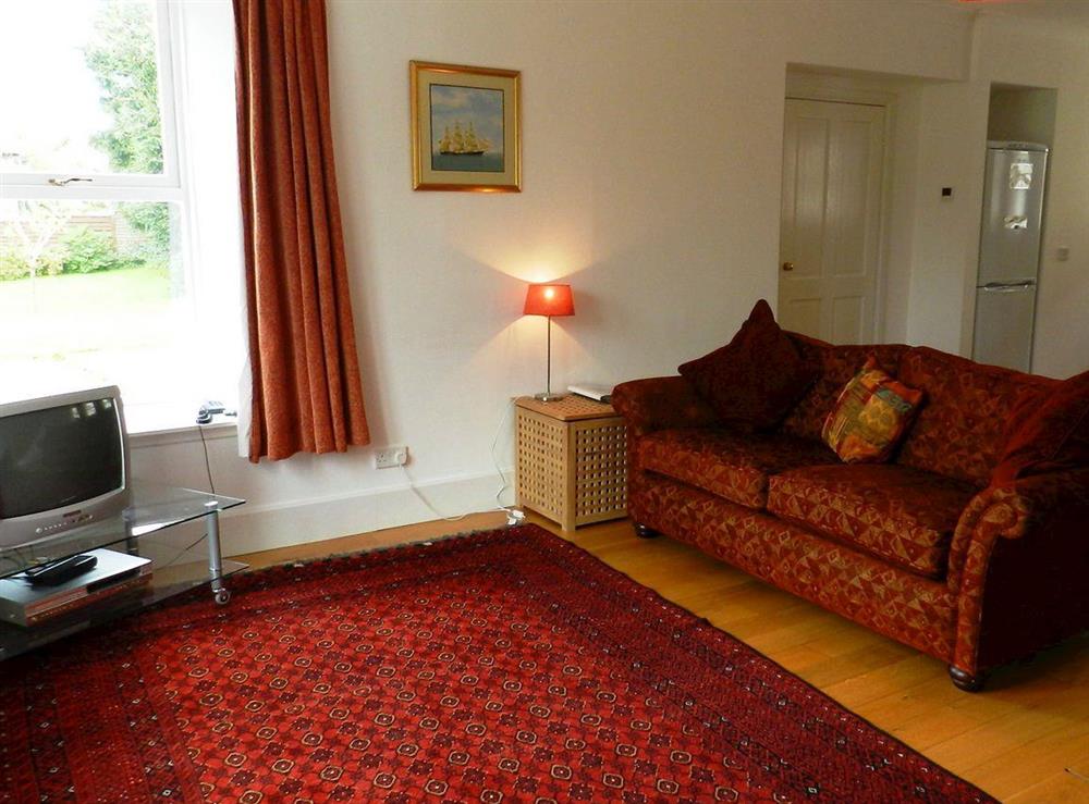 Open plan living space (photo 2) at Heathfield Cottage in Brodick, Isle of Arran, Scotland