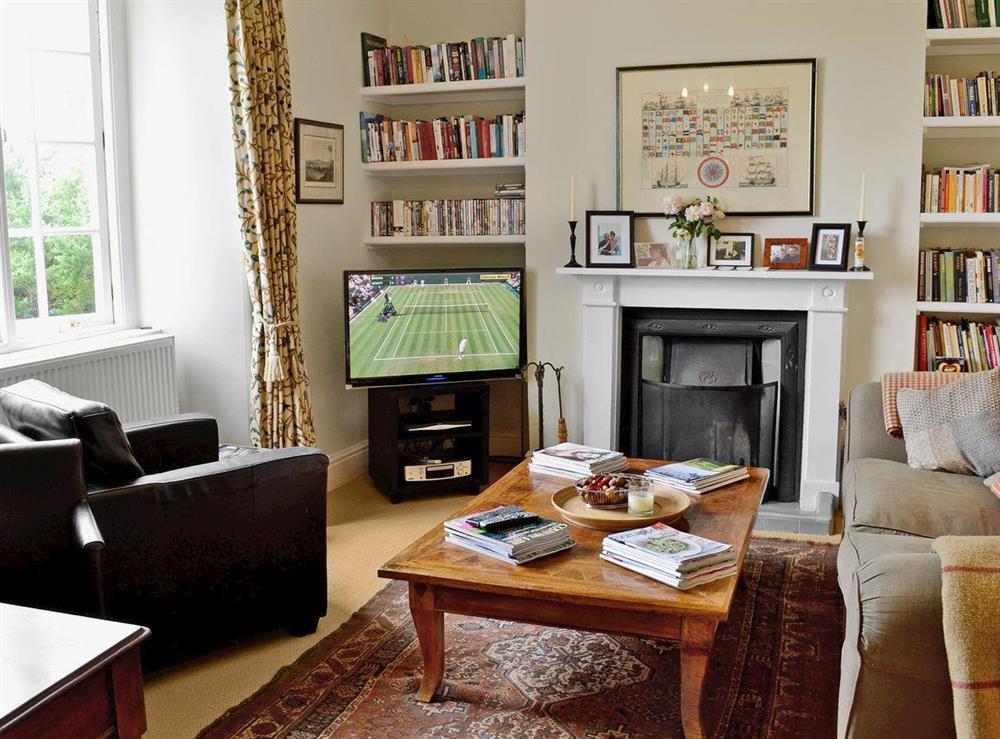 Living room with TV at Heathfield Down Farmhouse in Modbury, S. Devon., Great Britain