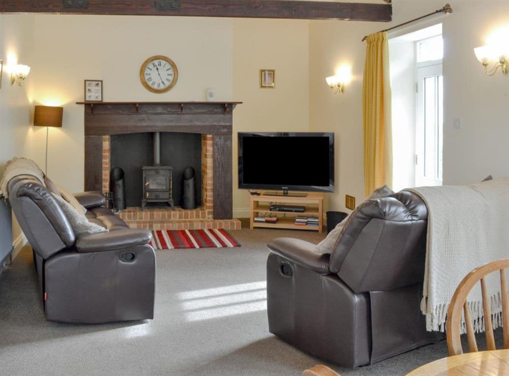 Comfortable living/ dining room at Heckley Cottage in Alnwick, Northumberland