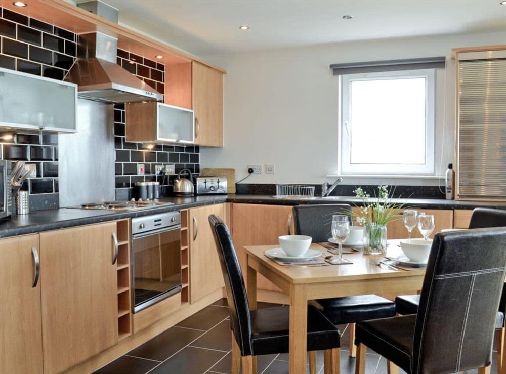 Open plan living/dining room/kitchen (photo 3) at Heddfan in Heddfan, Mileniwm Quay, Dyfed