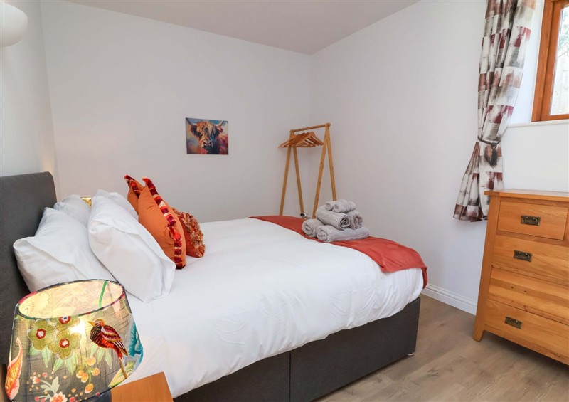 A bedroom in Hedgehog Hideaway at Hedgehog Hideaway, Parkham