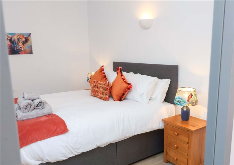 One of the bedrooms at Hedgehog Hideaway, Parkham