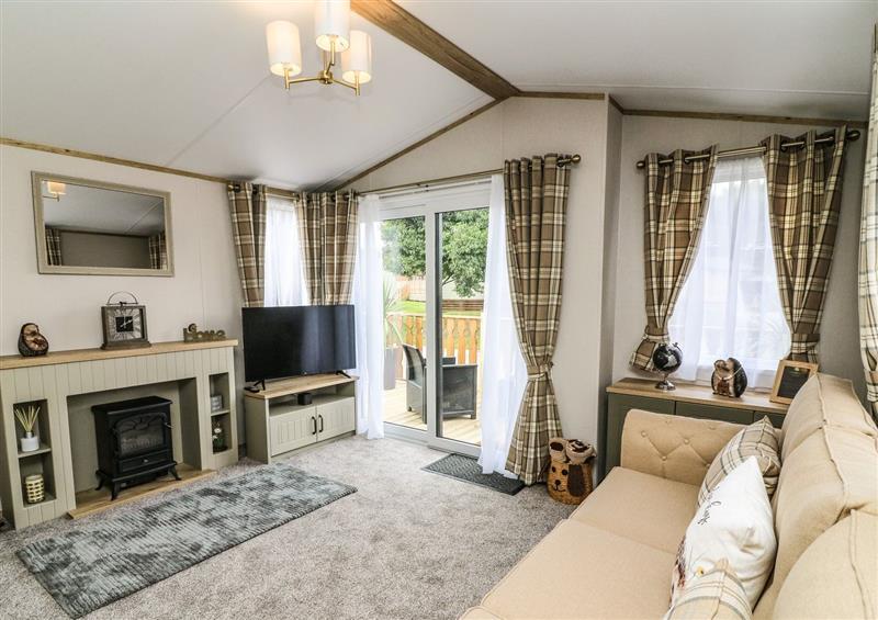 Relax in the living area at Hedgehog Lodge, South Lakeland Leisure Village