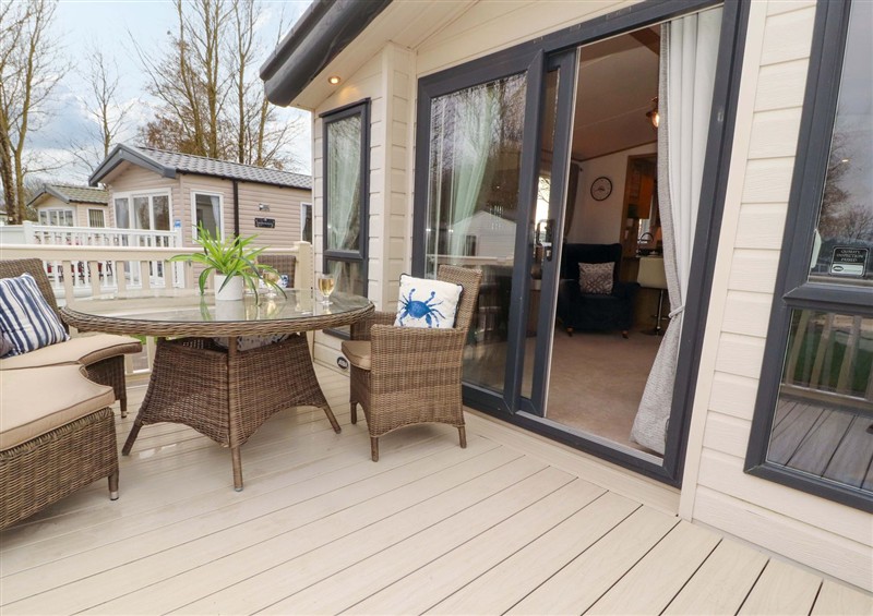 The patio in Hedgerow Lodge at Hedgerow Lodge, Haven Lakeside near Grange-Over-Sands