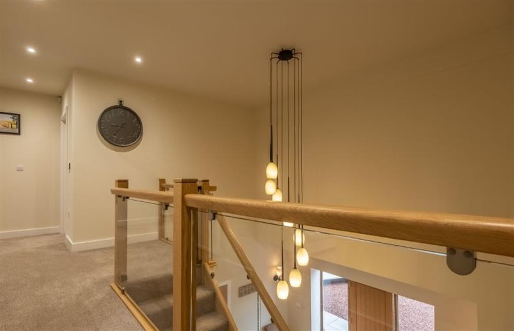 Arriving on the landing. The stairs have stair gates top and bottom. at Hedgerows, Burnham Market near Kings Lynn