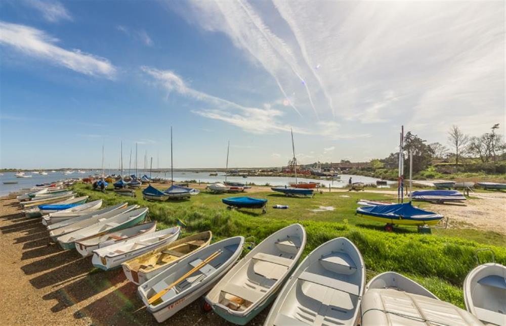 Boats lined up at nearby Brancaster Staithe at Hedgerows, Burnham Market near Kings Lynn
