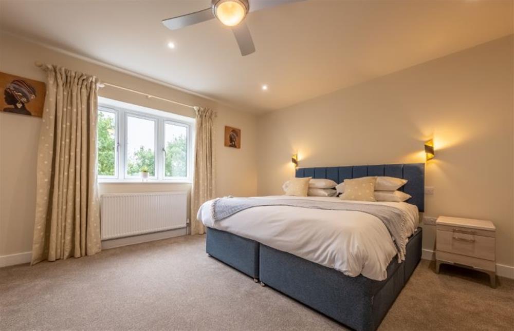 Master bedroom with 6’ super-king bed at Hedgerows, Burnham Market near Kings Lynn