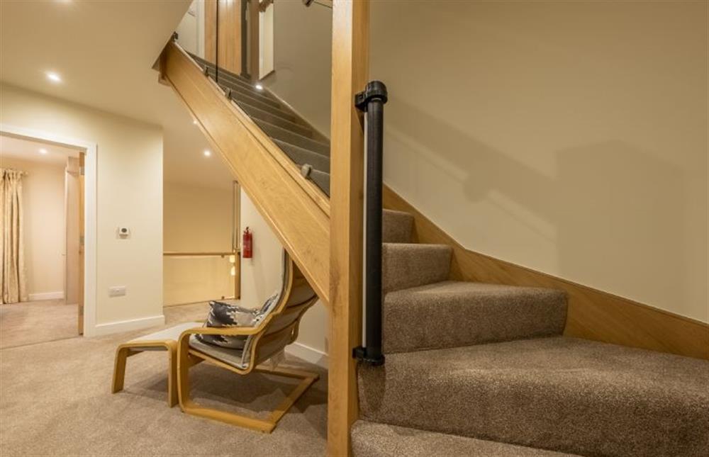 Stairs to the second floor also have stair gates top and bottom at Hedgerows, Burnham Market near Kings Lynn