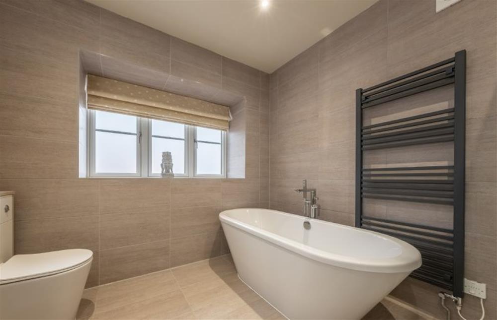 The family bathroom has a bath tub ... at Hedgerows, Burnham Market near Kings Lynn