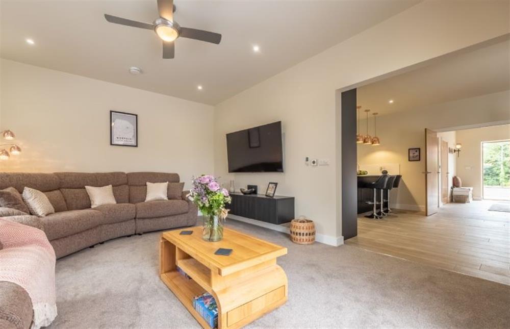 The sitting room looking back to the entrance at Hedgerows, Burnham Market near Kings Lynn