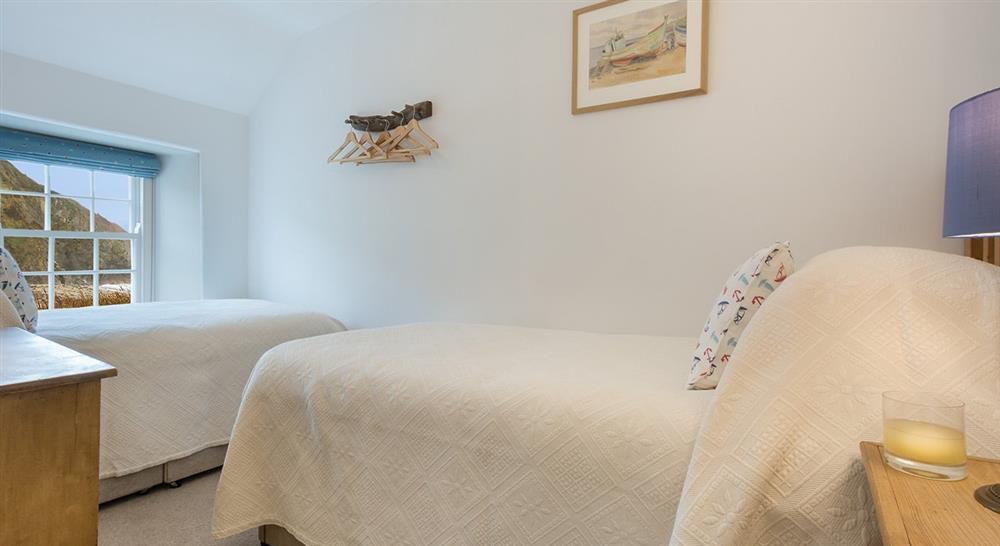 The twin bedroom at Hemmick Cottage in Cornwall, 