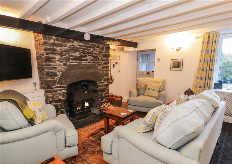Relax in the living area at Hen Bopty, Fairbourne